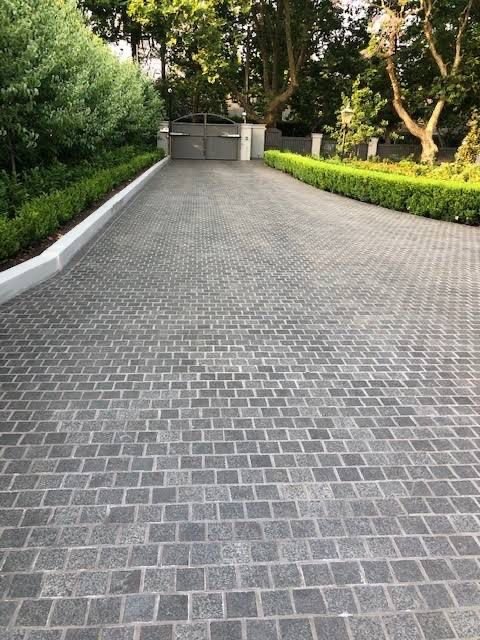 Outdoor terrace with architectural tile surfaces